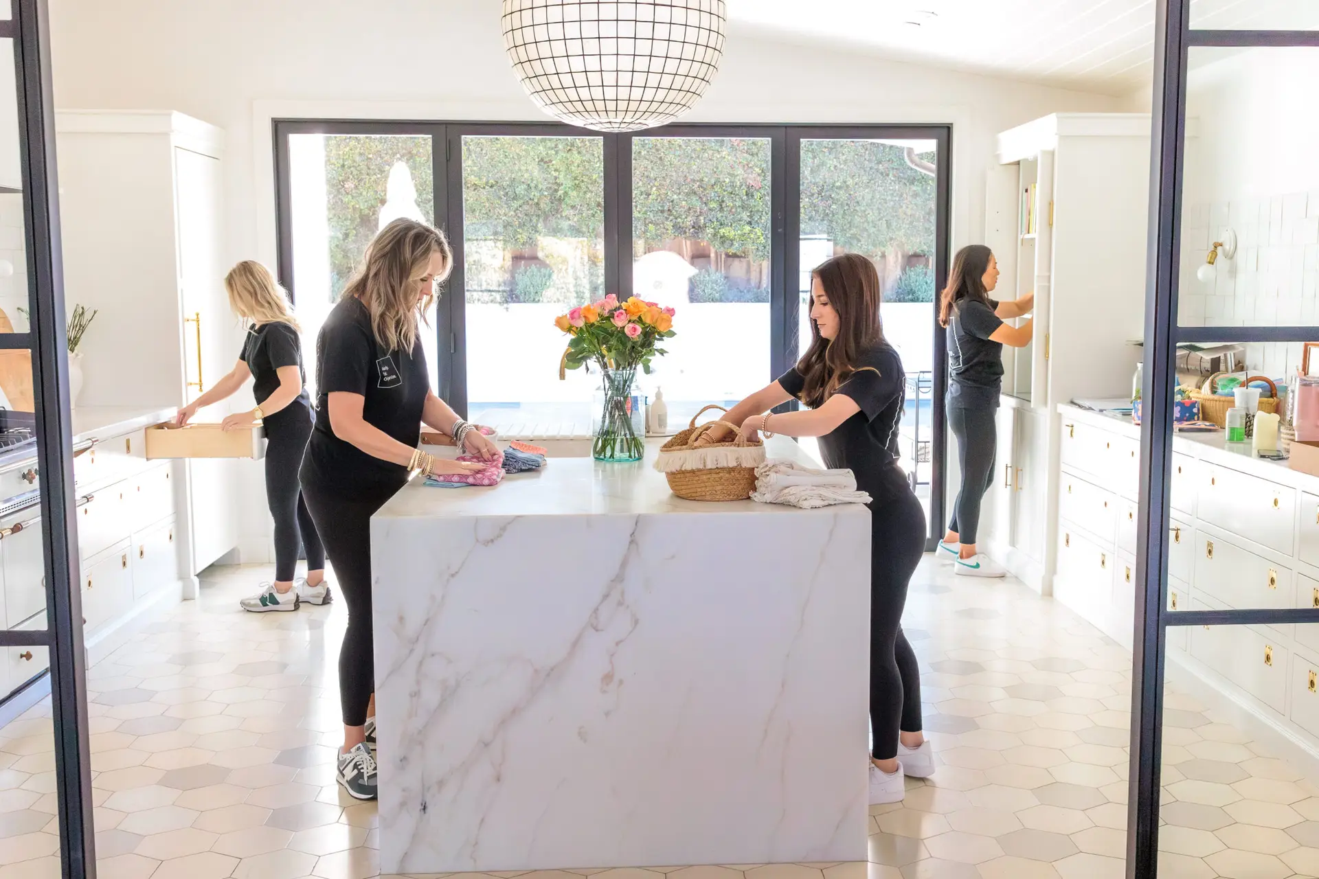 organizers organizing a kitchen