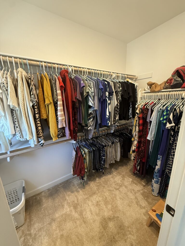 Organized closet in San Marcos after Ready Set Organize decluttering service — color-coordinated and ready for open houses
